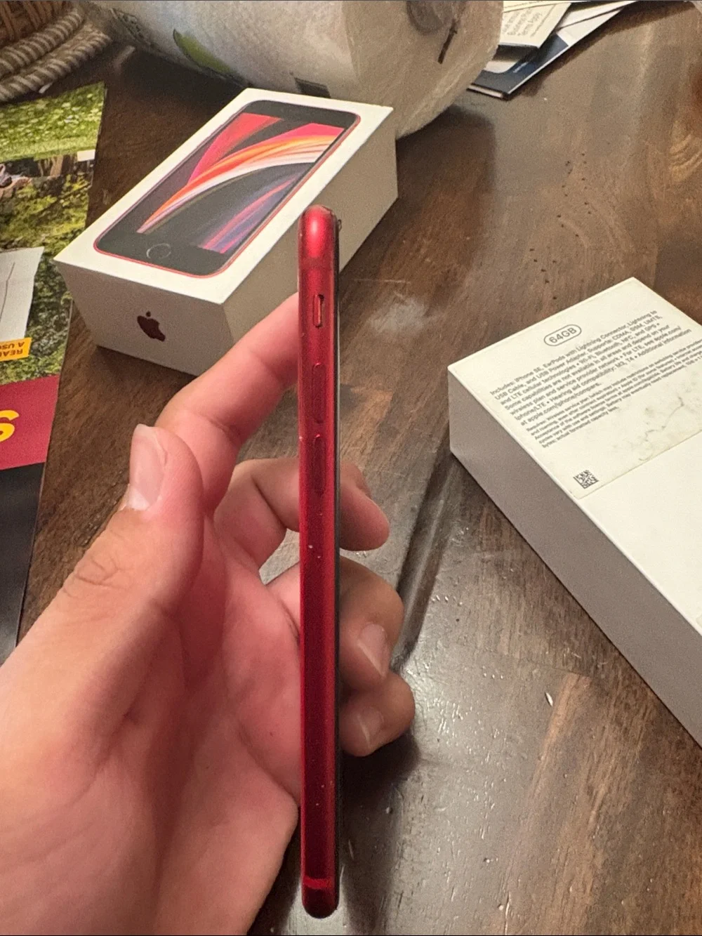 Apple iPhone SE in Red - Compact Touch ID Smartphone, Tiny crack in back.